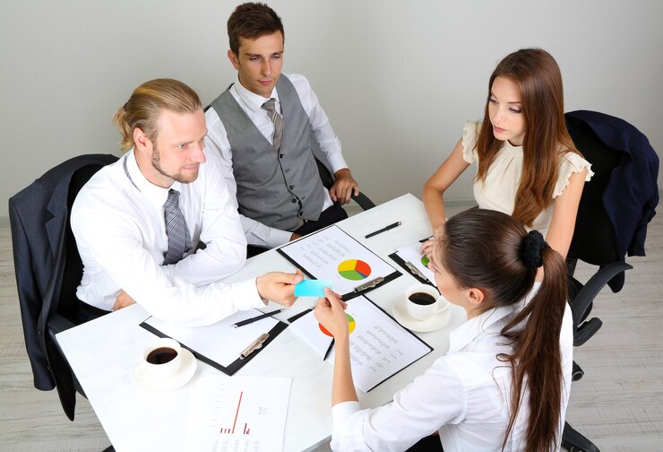 Group of business people having meeting together